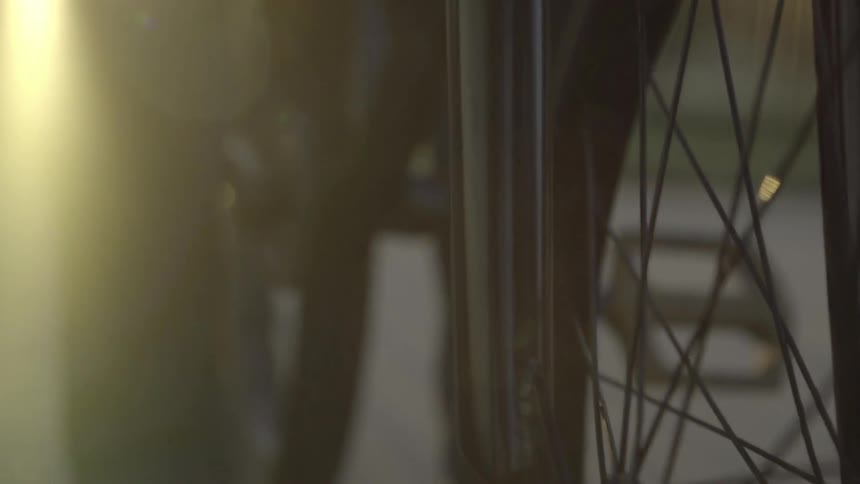 The bottom of a bicycle is shown