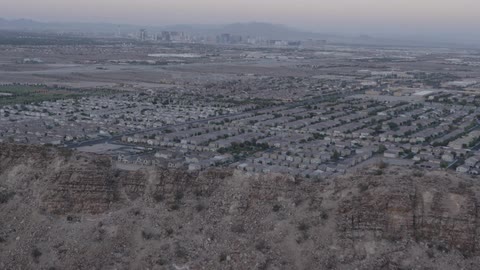 A city looms in the distance