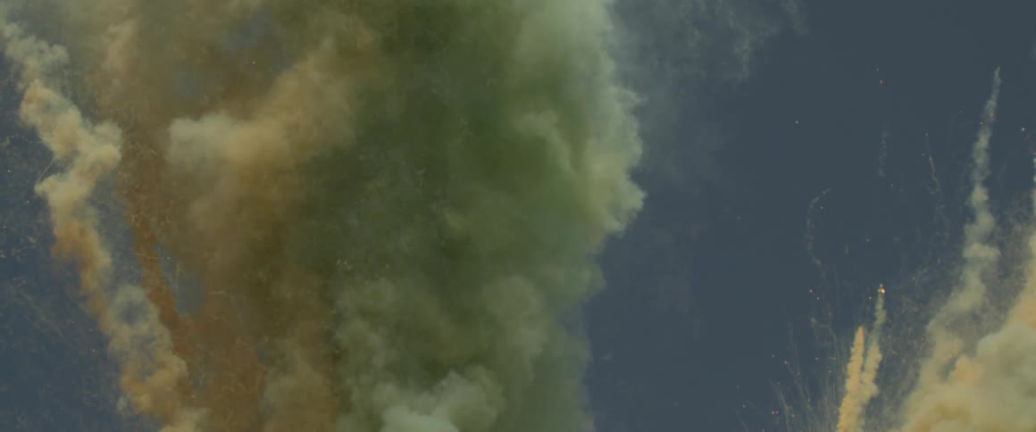 Multi-colored substance floats in a liquid