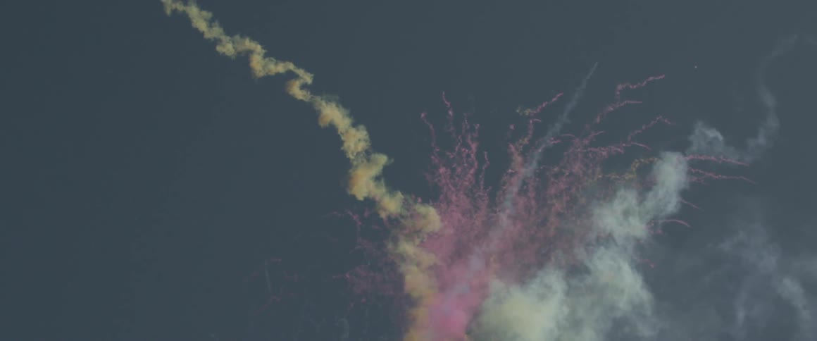 Colorful flares going into a clear sky