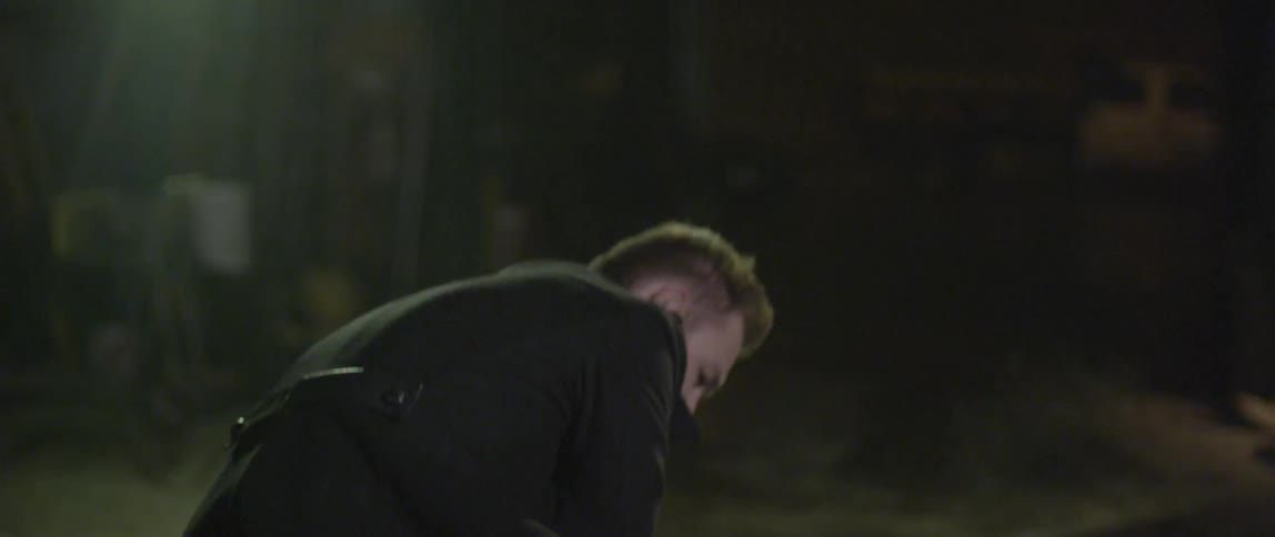 A man hits a burglar right on his head