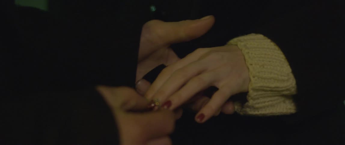 A person proposing with a ring