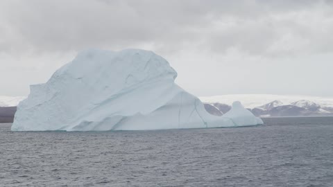 Large piece of ice protruding from a cold sea