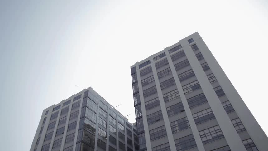 Two high-rise buildings side by side