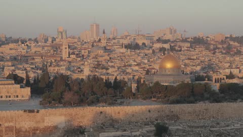 The sun shines on a city
