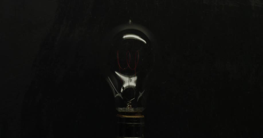 A light bulb illuminates and then goes dark