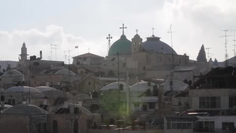 A town's buildings are shown in the daytime