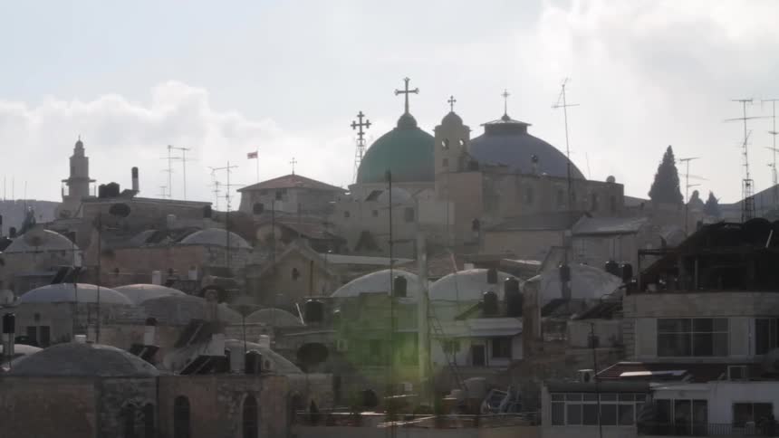 A town's buildings are shown in the daytime