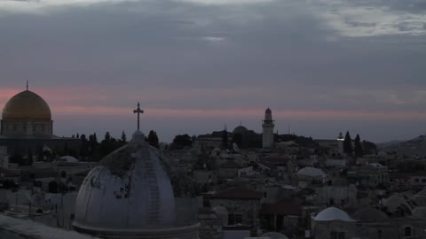 A city is seen at dusk
