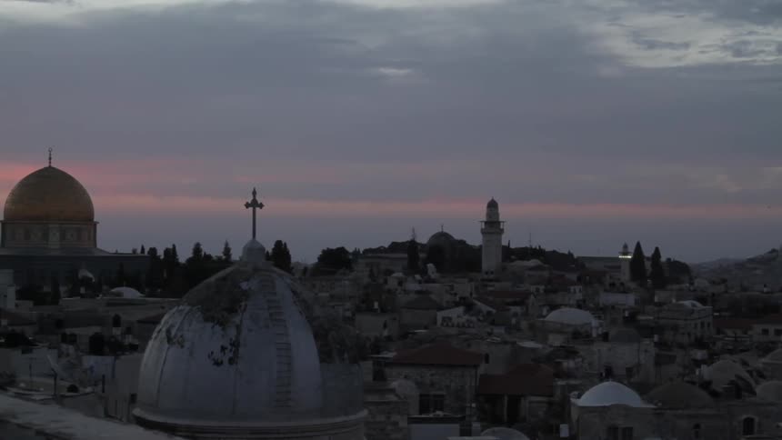 A city is seen at dusk