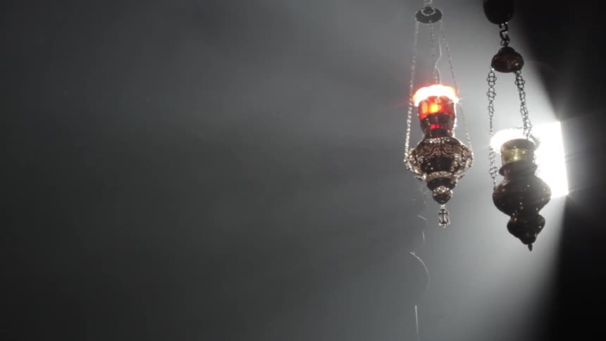 A decorative lighting fixture is shown