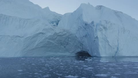 Icebergs drift in cold water
