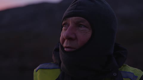 The man looks back