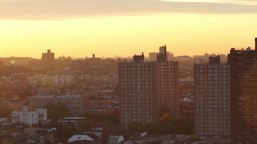 A panoramic view of city at sunset