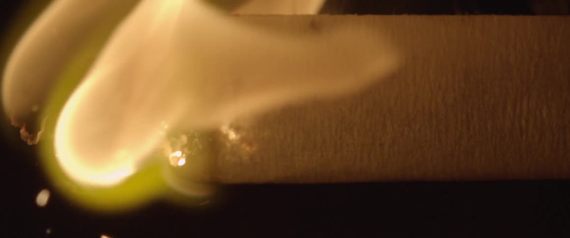 An object burned by a flame slowly