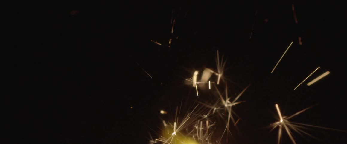 A close view of sparks from a flame
