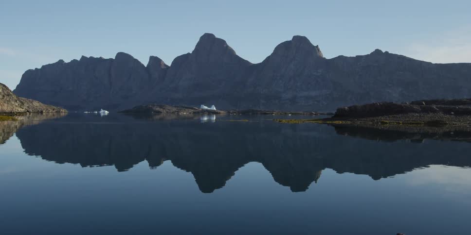 A lake overlooking a mountain