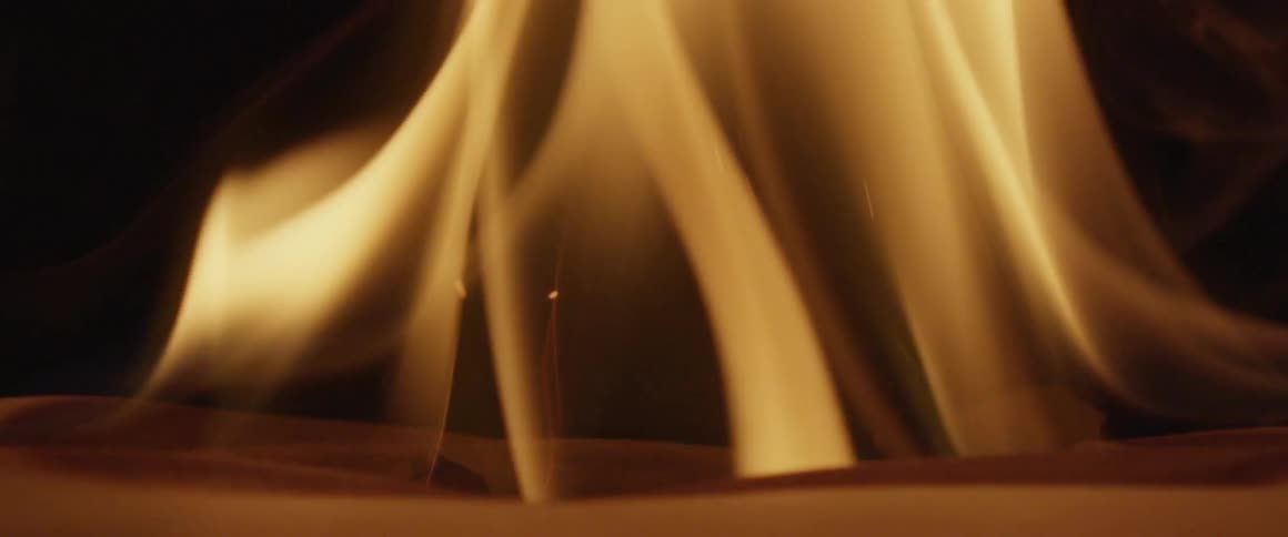 A close view of fire burning through paper
