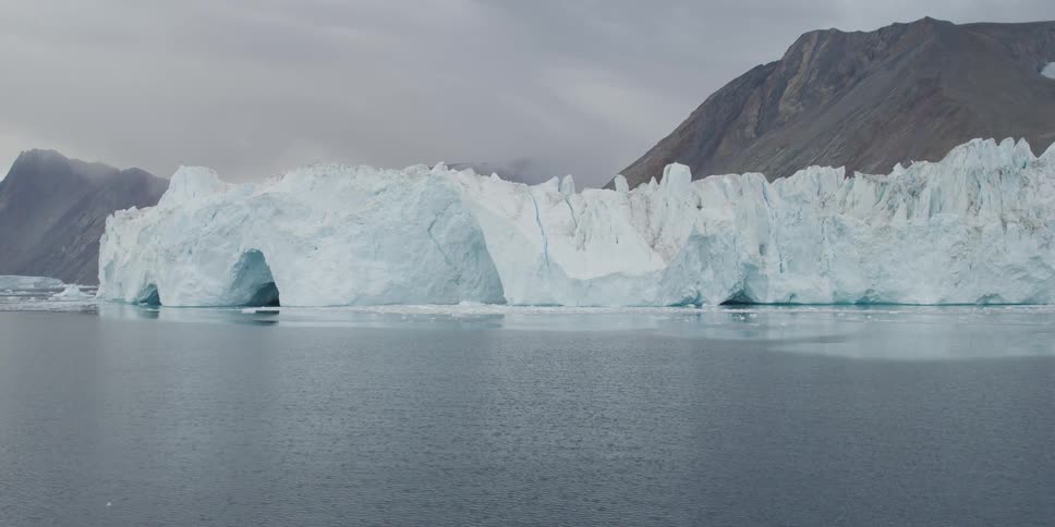 View of a body of water and a large glacier