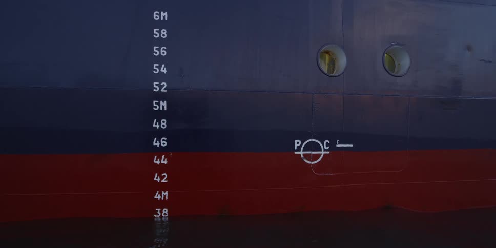 A ship floats on the water