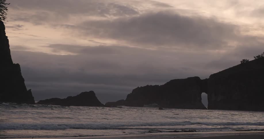 A large cove by the ocean on a cloudy morning