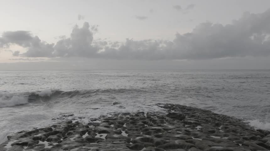 Waves crashing on a rocky shore