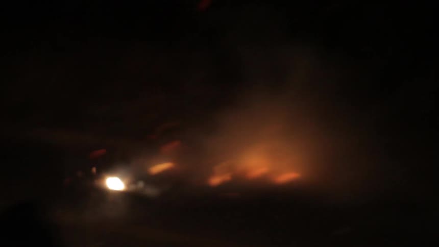 Someone lighting some firecrackers and then running away as they explode