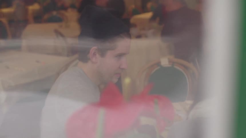 People sitting inside of a restaurant