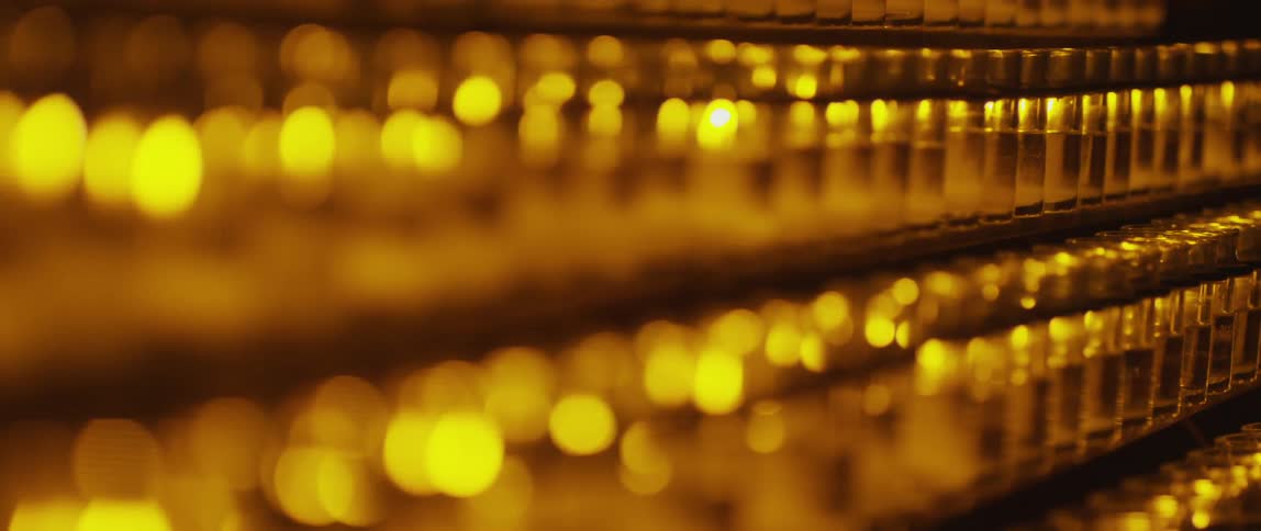 Rows of candles flicker and burn