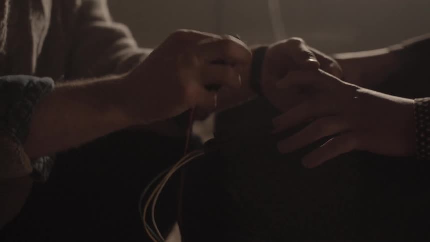 A person being hooked up to a machine