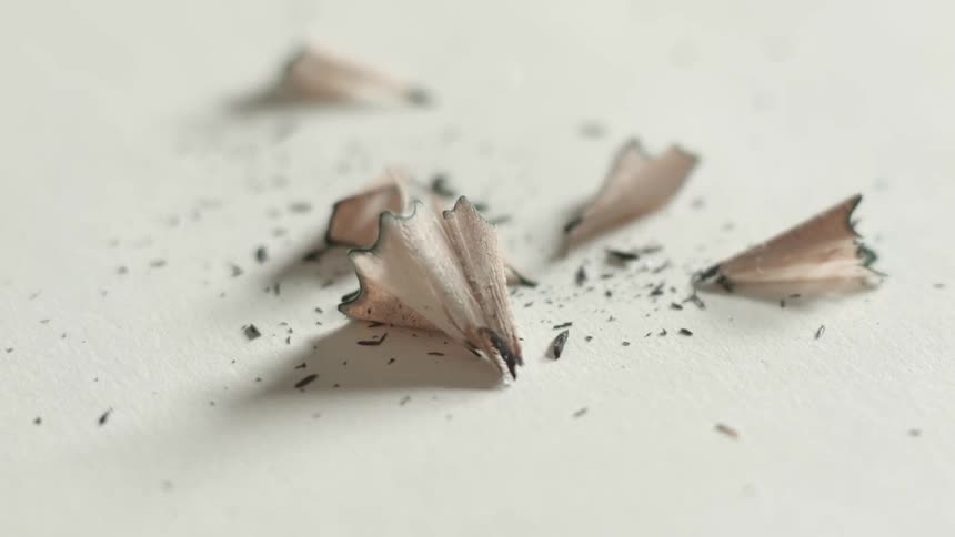 Shavings from pencil get wiped away