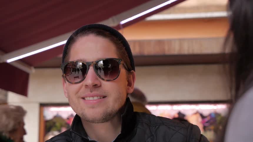 The man man smiles to the woman