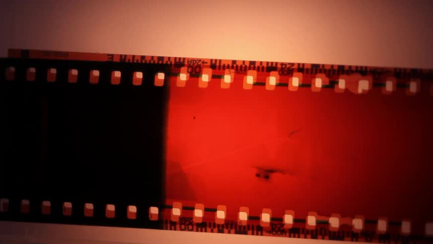 Piece of film reel being lined up