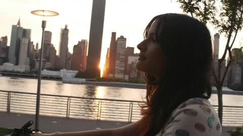 A person walking next to a river