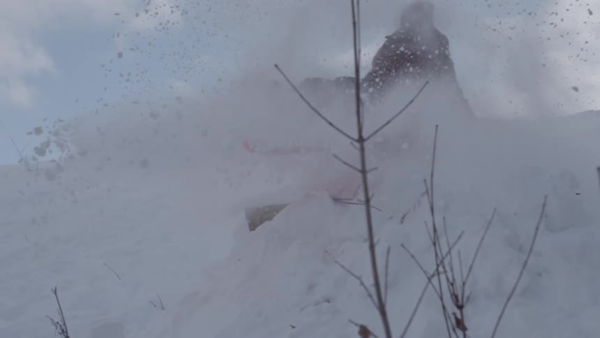 A person playing in the snow