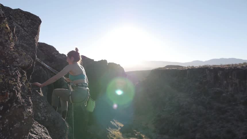A woman rock climbing