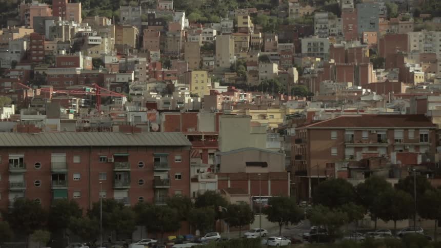 View of a town with many houses and buildings on a sunny day