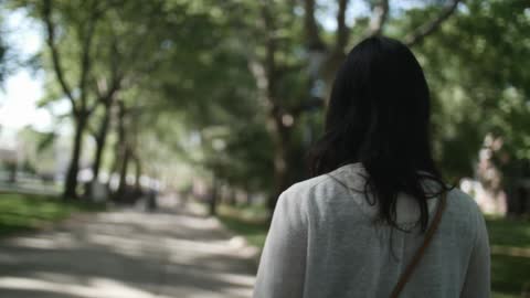 Woman going for a walk on a sunny day