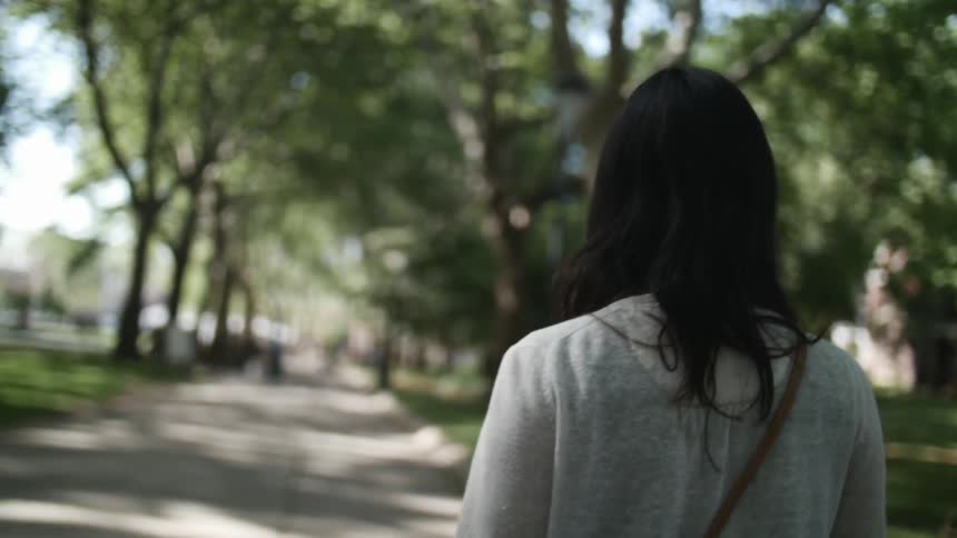 Woman going for a walk on a sunny day