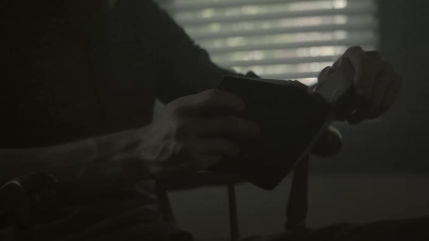 A man is reading his old diary