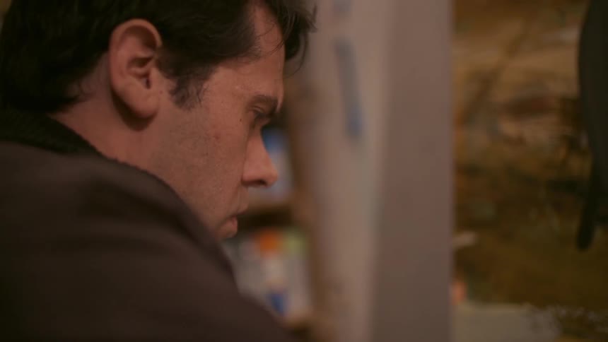 A person staring at the ground