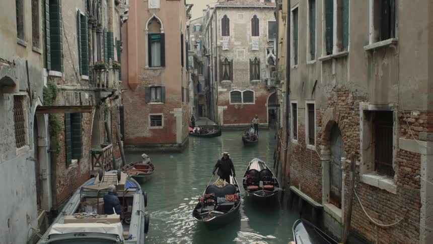 Gondola's travelling down a canal
