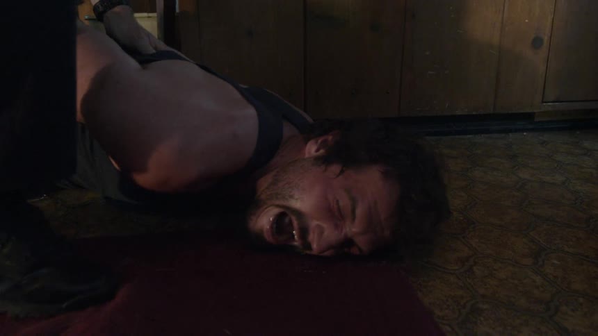 The man is arrested on the floor