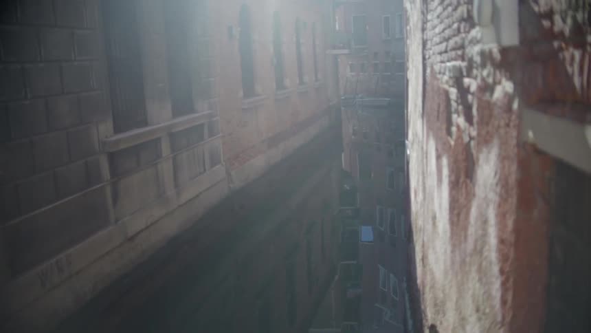 A canal flows through city buildings