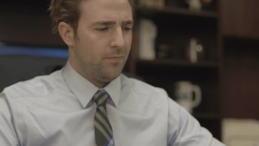 A businessman does paperwork