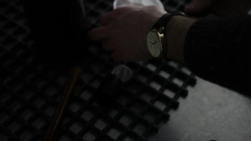 A man working with a film role