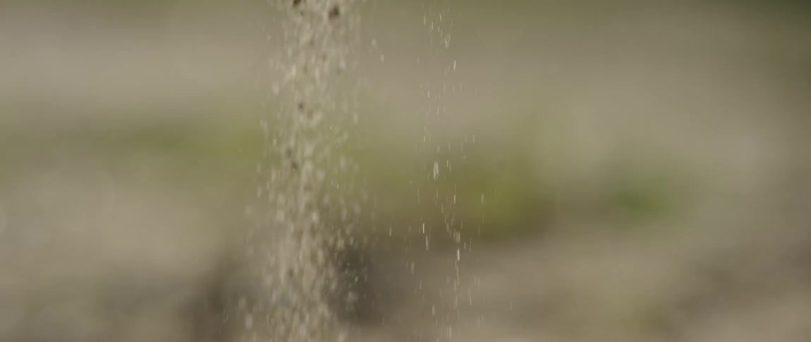 Sand running thru fingers