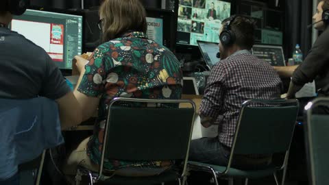 People working in front of computers