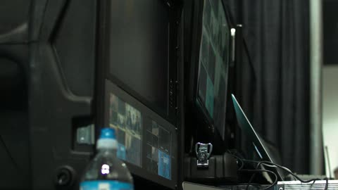 Several monitors showing images