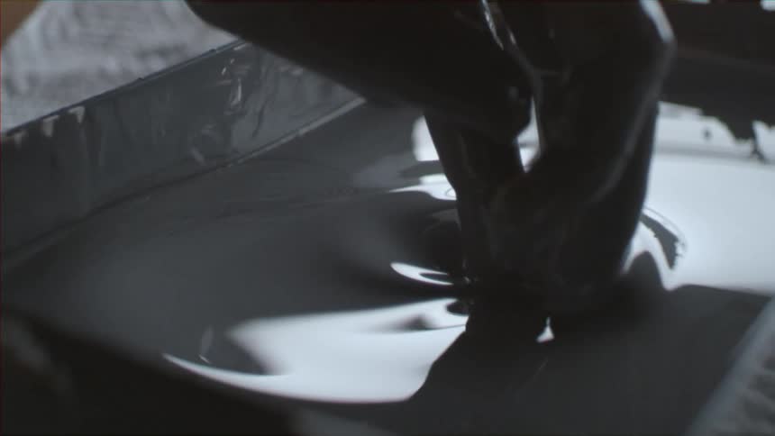 Treat is being dunked in a pool of chocolate
